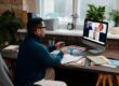 teacher-video-calling-with-his-students-using-a-computer